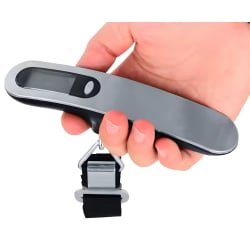 Elektronische Kofferwaage wagPRO-H50K in der Hand gehalten